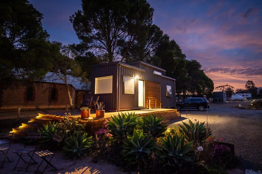 'Peony' exterior view with patio deck at dusk
