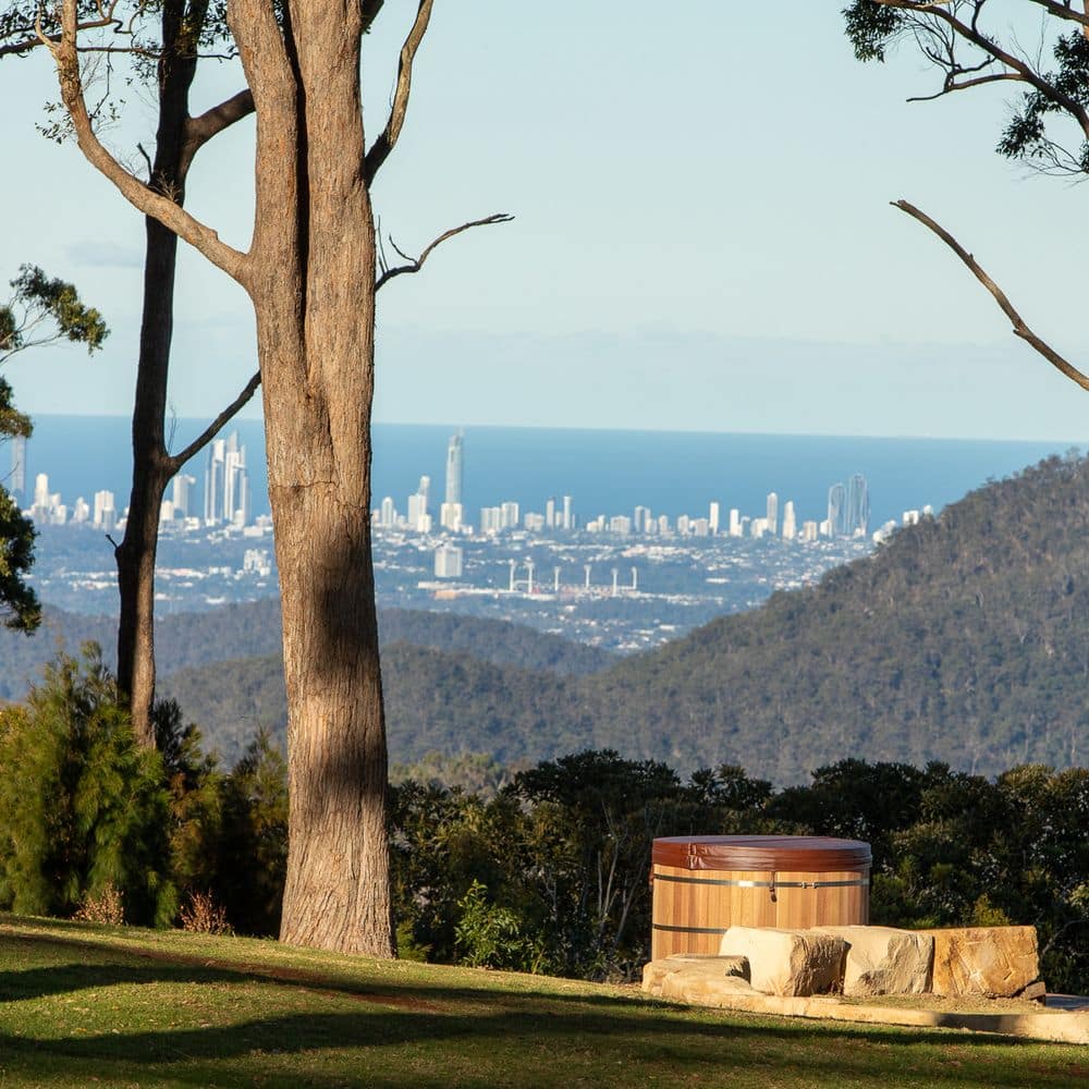 Cedar hot tub overlooking the GC skyline