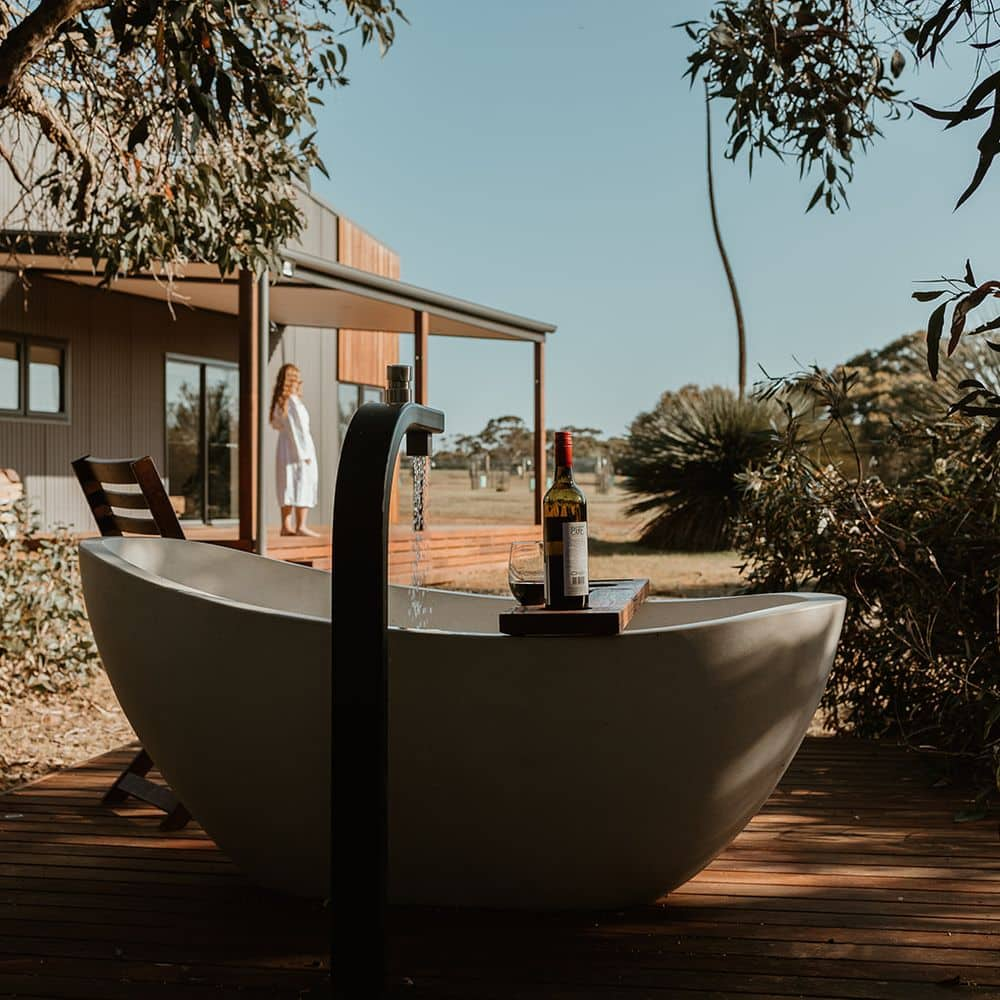 Outdoor stone bath at The Rise