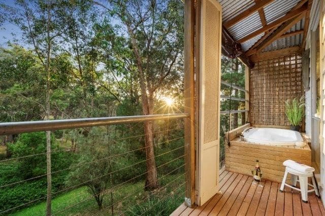 2 person spa on back deck at sunset