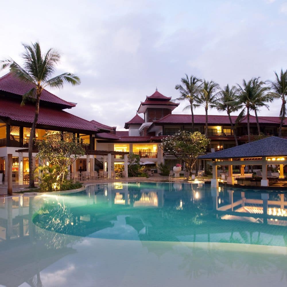 Holiday Inn Resort Baruna Bali, an IHG Hotel - Main pool at dusk