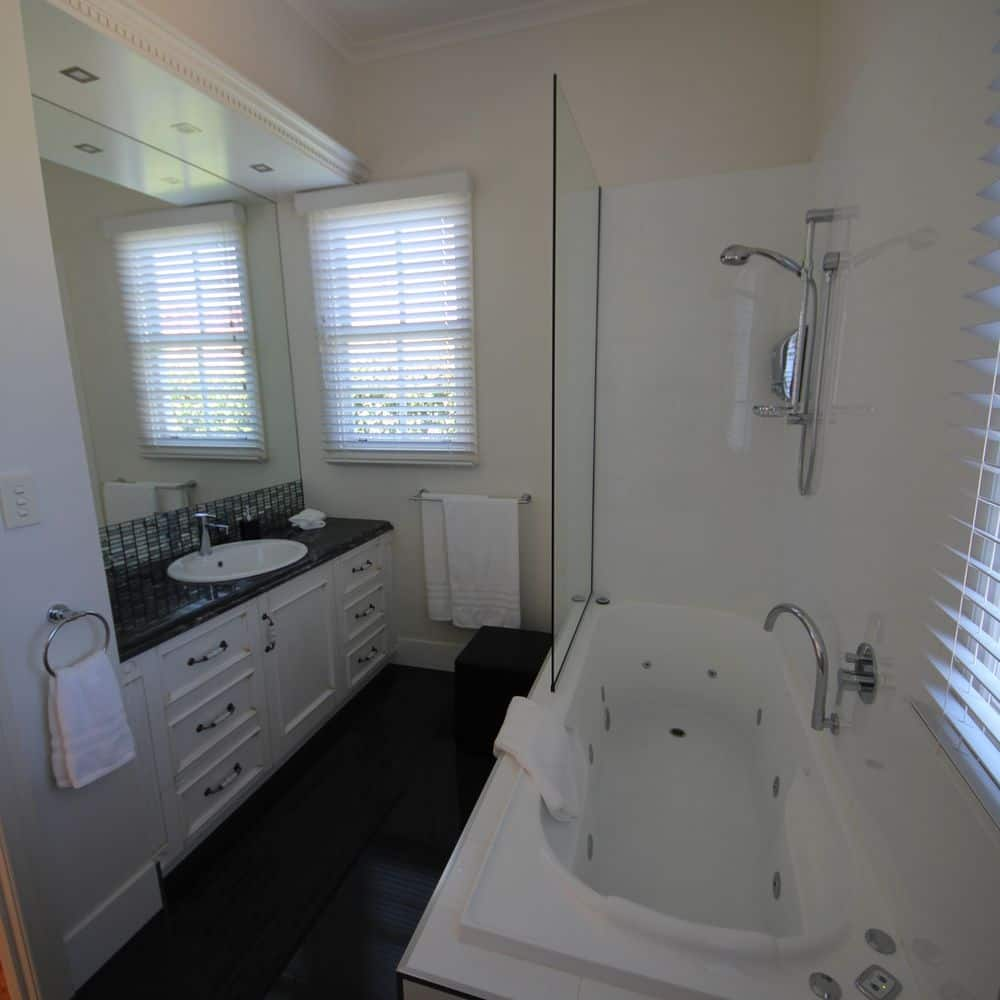 Studio Apartment Bathroom w/ Spa Bath