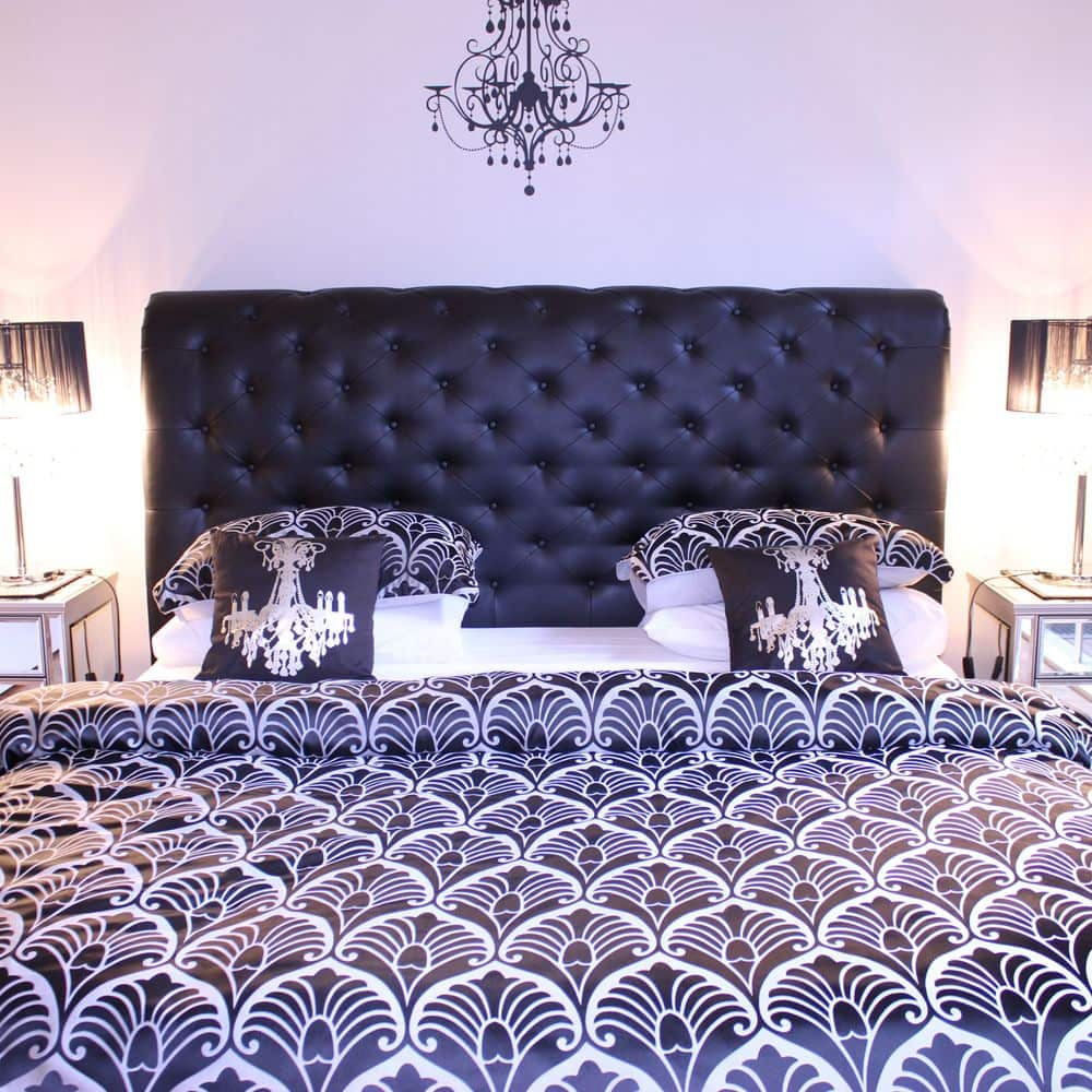 The Fleur De Lis' king size bed.