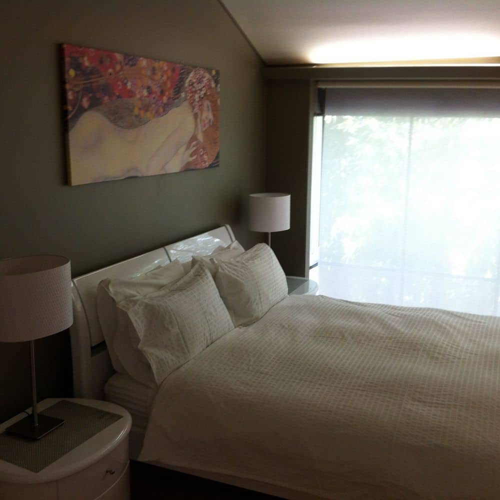 First floor bedroom with  tree top outlook