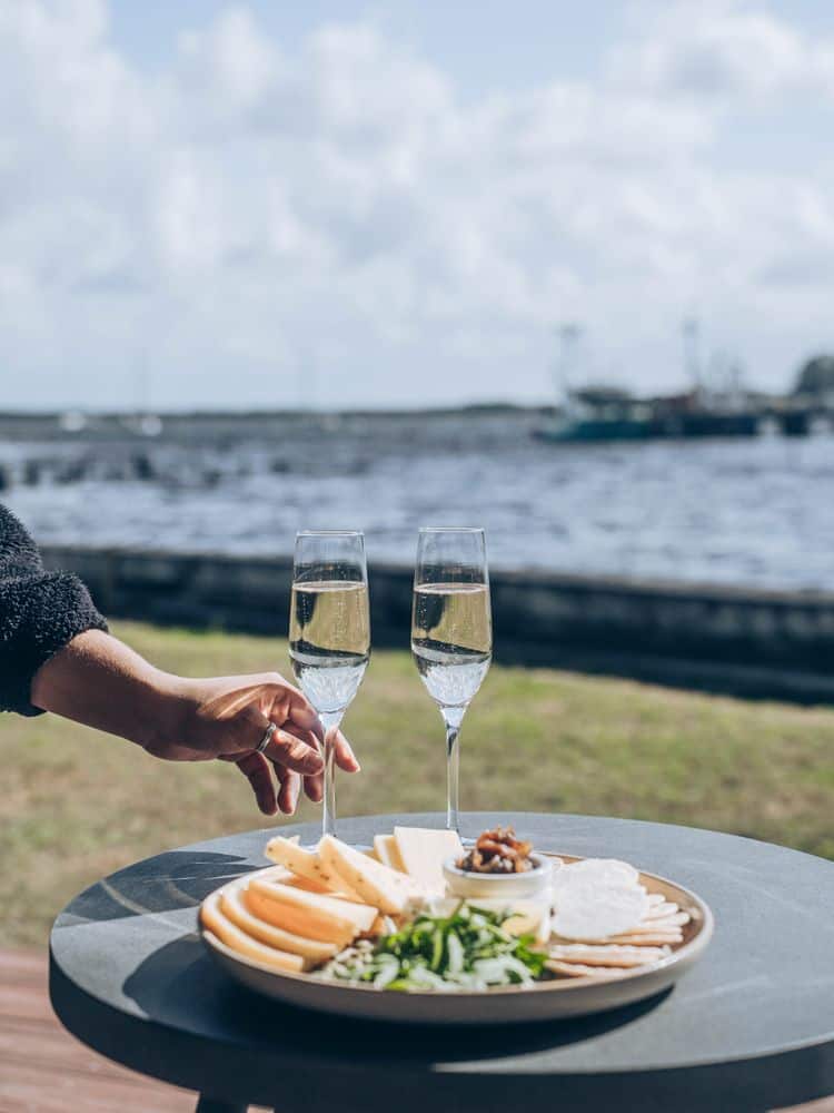 Sparkling + cheese with stunning waterfront views